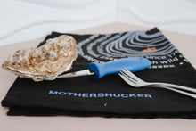 Load image into Gallery viewer, Mersea Oyster with a shucking knife on a black towel with 'Mothershucker' branding. Oyster forks. Shucking bundle.