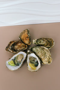 3 mersea oysters and 3 jersey oysters. 