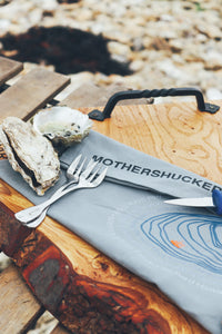 Grey shucking towel. Oyster forks. Oyster shucking knife. 