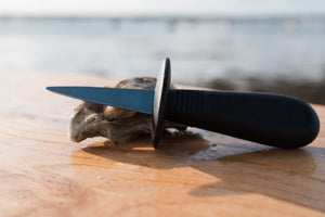 Shucking knife with guard. 