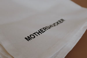 White mothershucker towel 